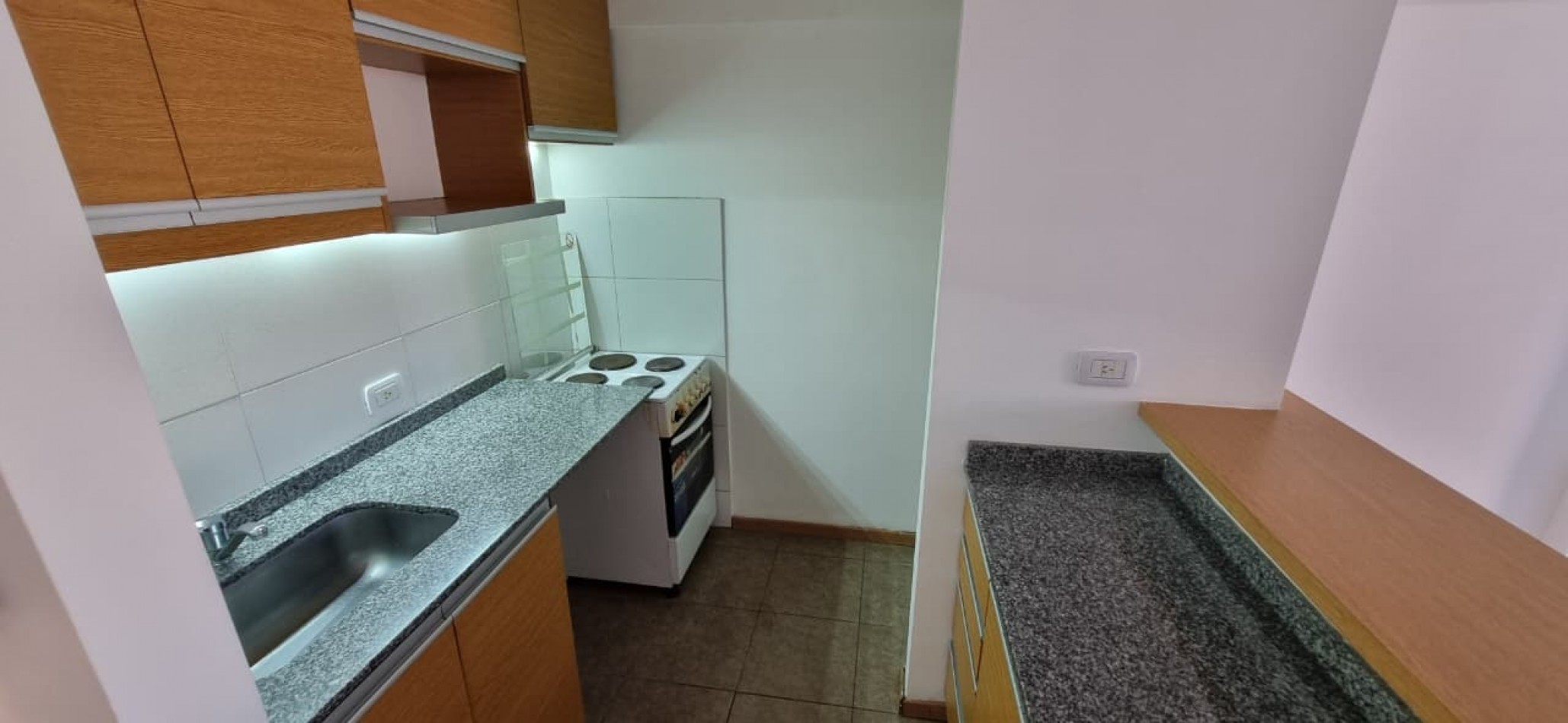 Departamento de 2 ambientes con cochera cubierta