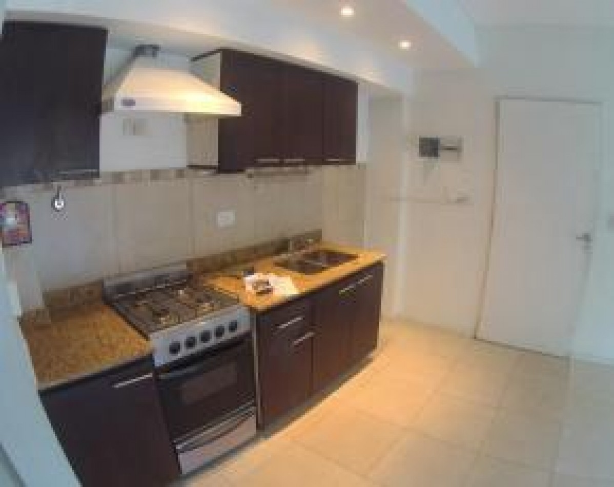 Departamento 2 amb. en planta baja con cochera